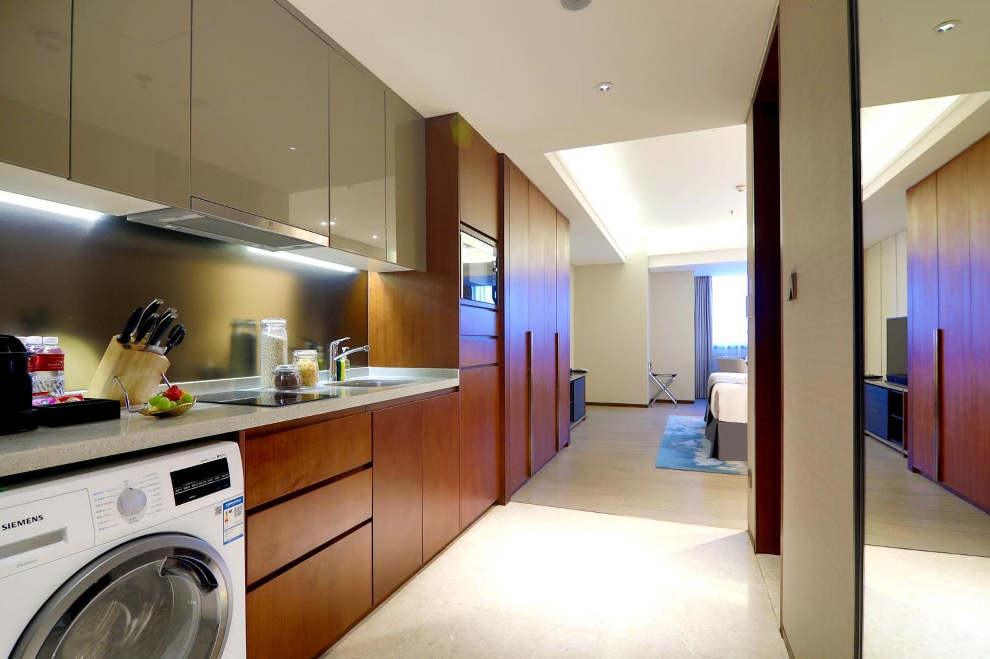 เฟรเซอร์ สวีท ต้าเหลียน Aparthotel ภายนอก รูปภาพ